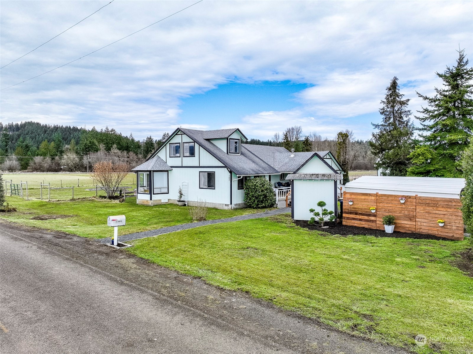 127 Beam Road Chehalis, WA 98532 - Photo 1 of 40 a front view of a house with a yard