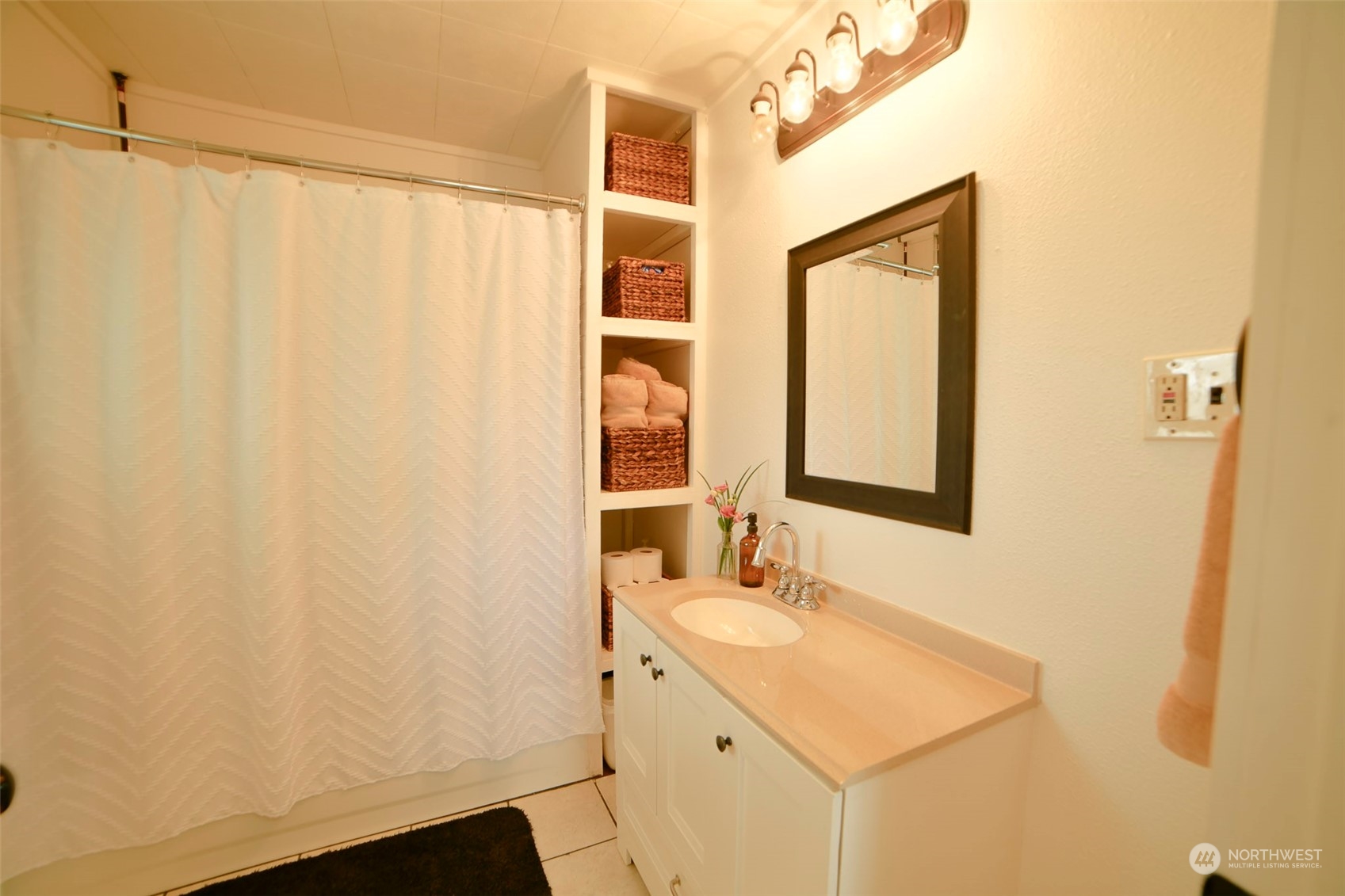 127 Beam Road Chehalis, WA 98532 - Photo 31 of 40 a bathroom with a sink and a mirror