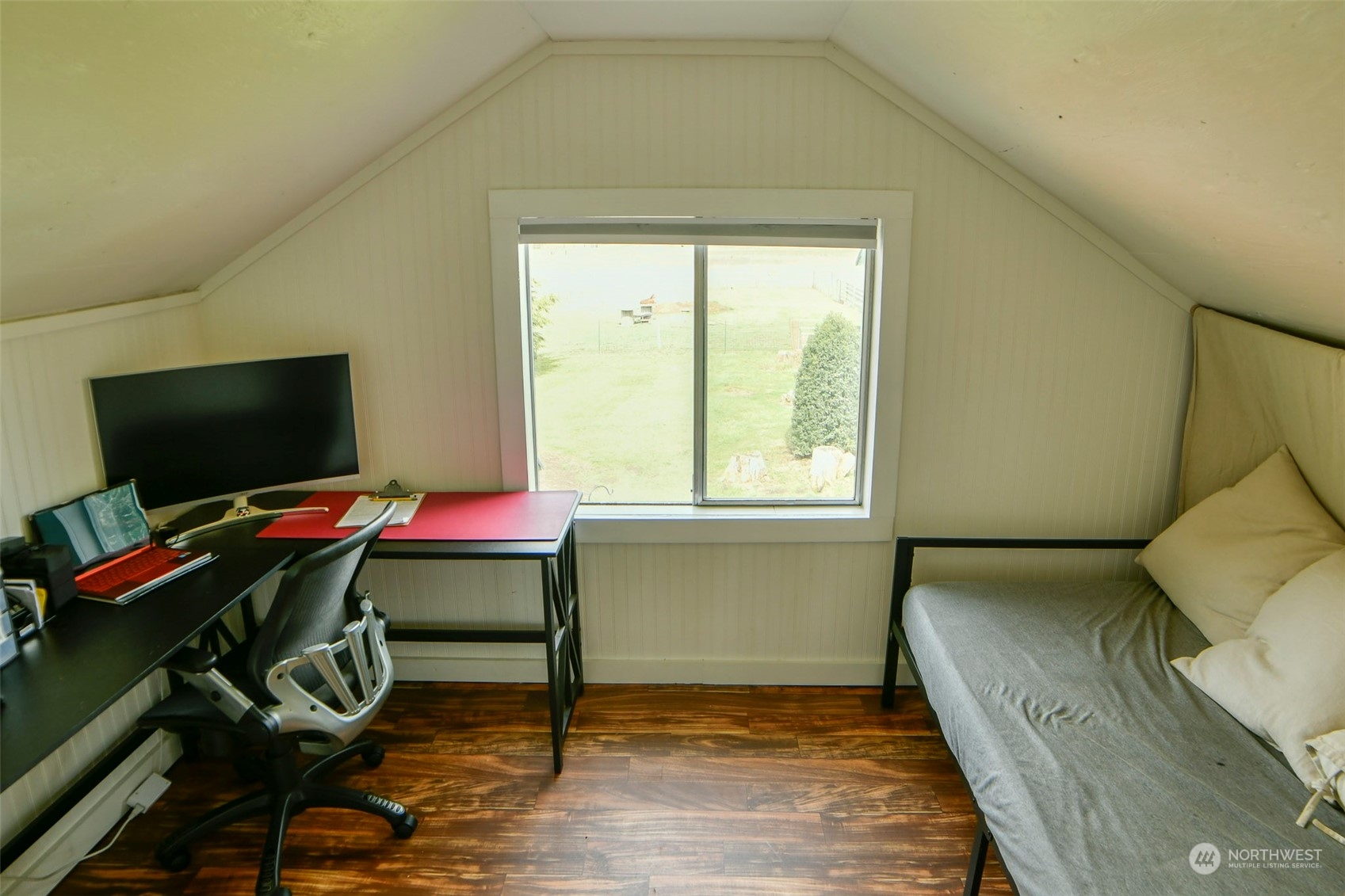 127 Beam Road Chehalis, WA 98532 - Photo 36 of 40 a bedroom with a bed and a flat screen tv