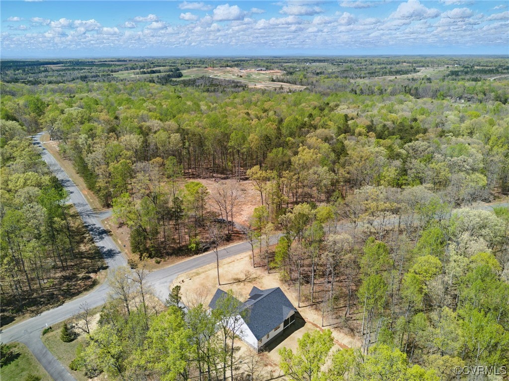 86 Promise Lane Bumpass, VA 23024 - Photo 5 of 46 a view of a yard with an outdoor space