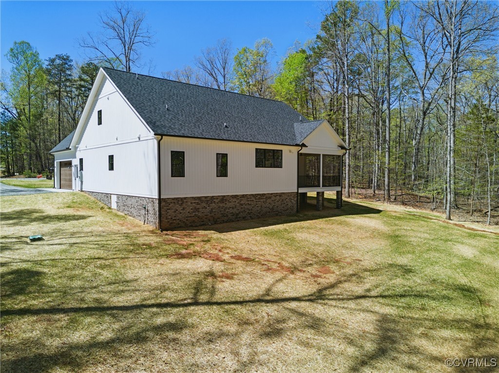 86 Promise Lane Bumpass, VA 23024 - Photo 10 of 46 a view of a house with a yard