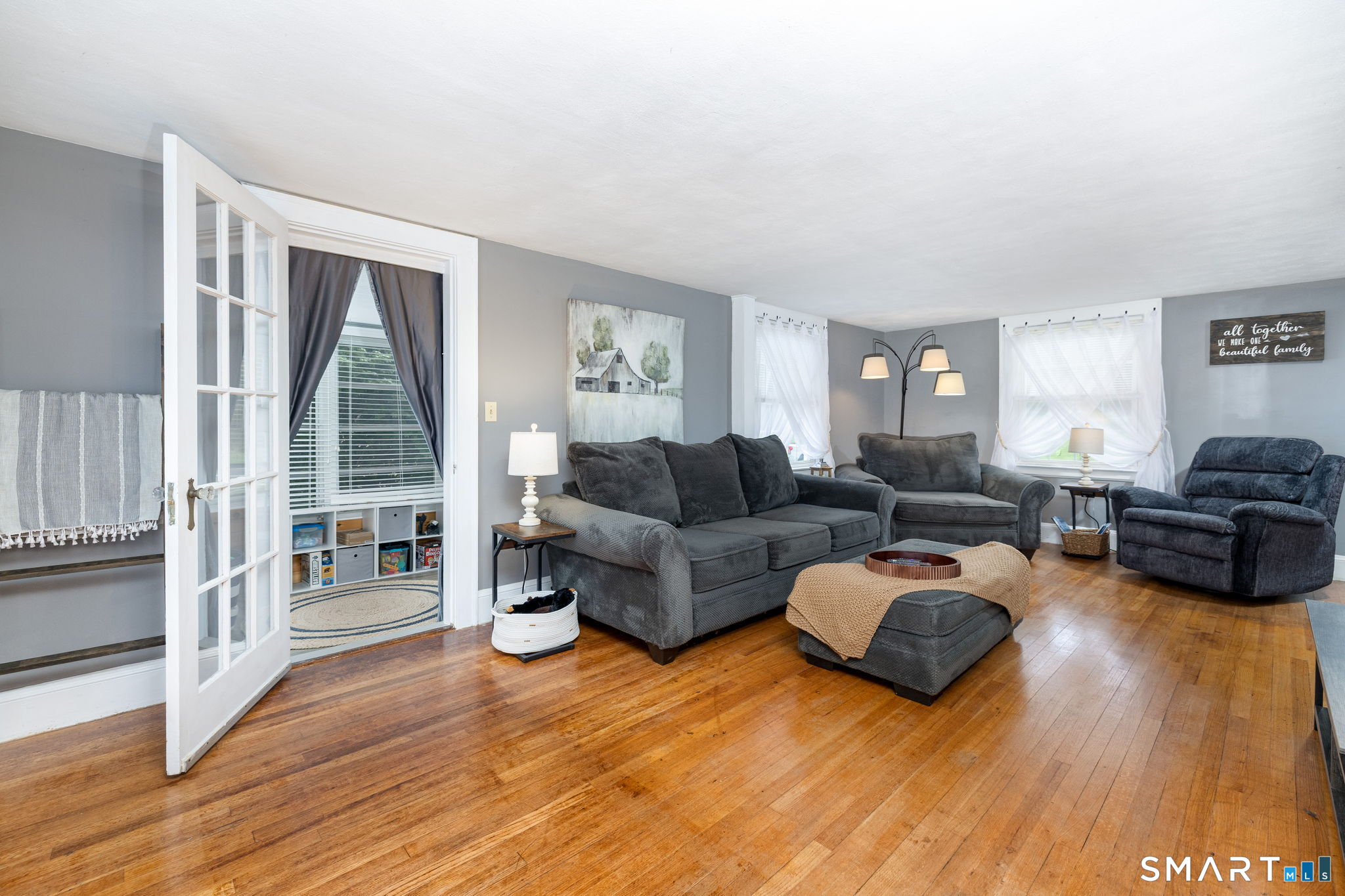 564 Main Street Portland, CT 06480 - Photo 5 of 40 Hardwood Floors, Built-ins, and a conveniently located sunroom for your morning coffee, or nightcap under the stars