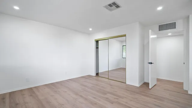 a view of empty room with windows