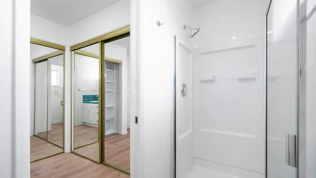 a view of a patio with table and chairs and potted plants