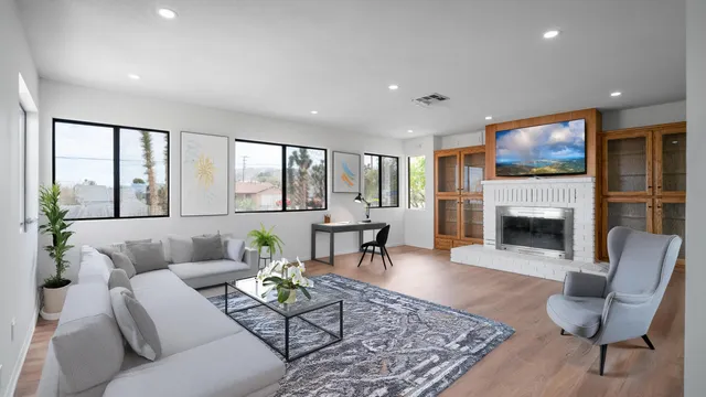 a bathroom with a glass shower door and a glass door