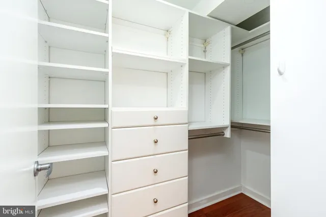 a view of an empty walk in closet