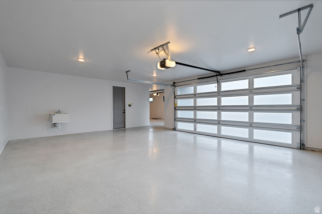 2145 North Main Street Centerville, UT 84014 - Photo 24 of 53 Garage with a sink and a garage door opener