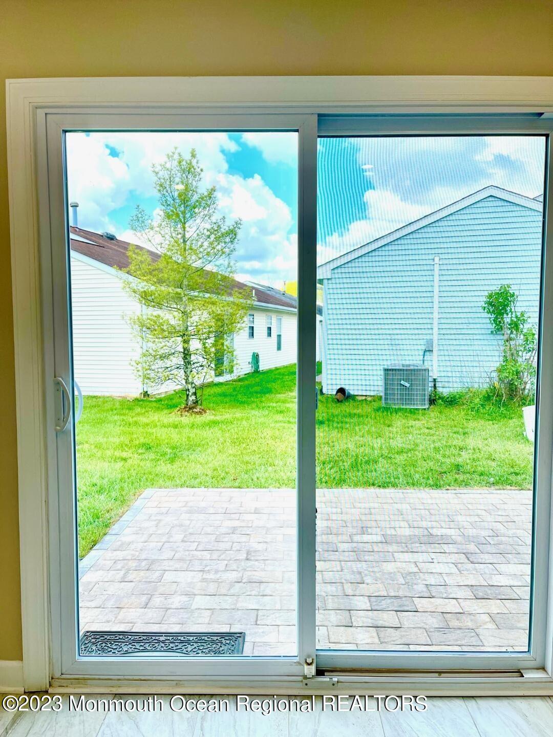 9 Ivy Ridge Close, Unit 1000 Freehold, NJ 07728 - Photo 15 of 31 9 IVY NEW KIT DOOR