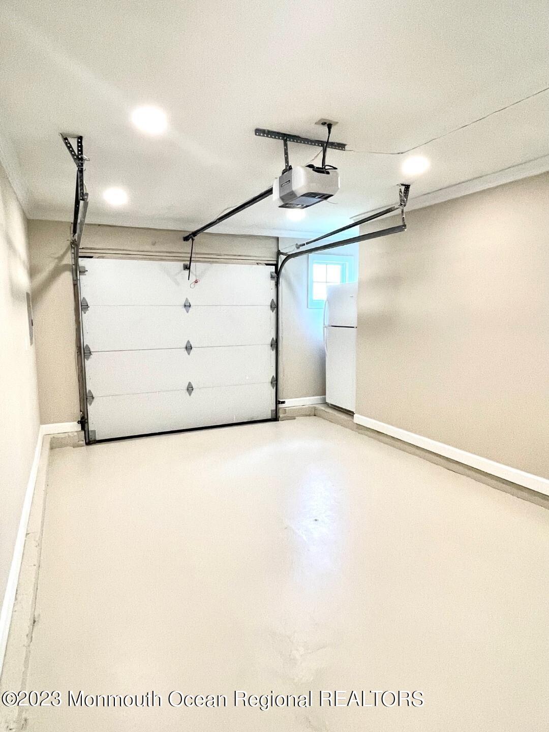 9 Ivy Ridge Close, Unit 1000 Freehold, NJ 07728 - Photo 24 of 31 9 IVY NW GARAGE 2