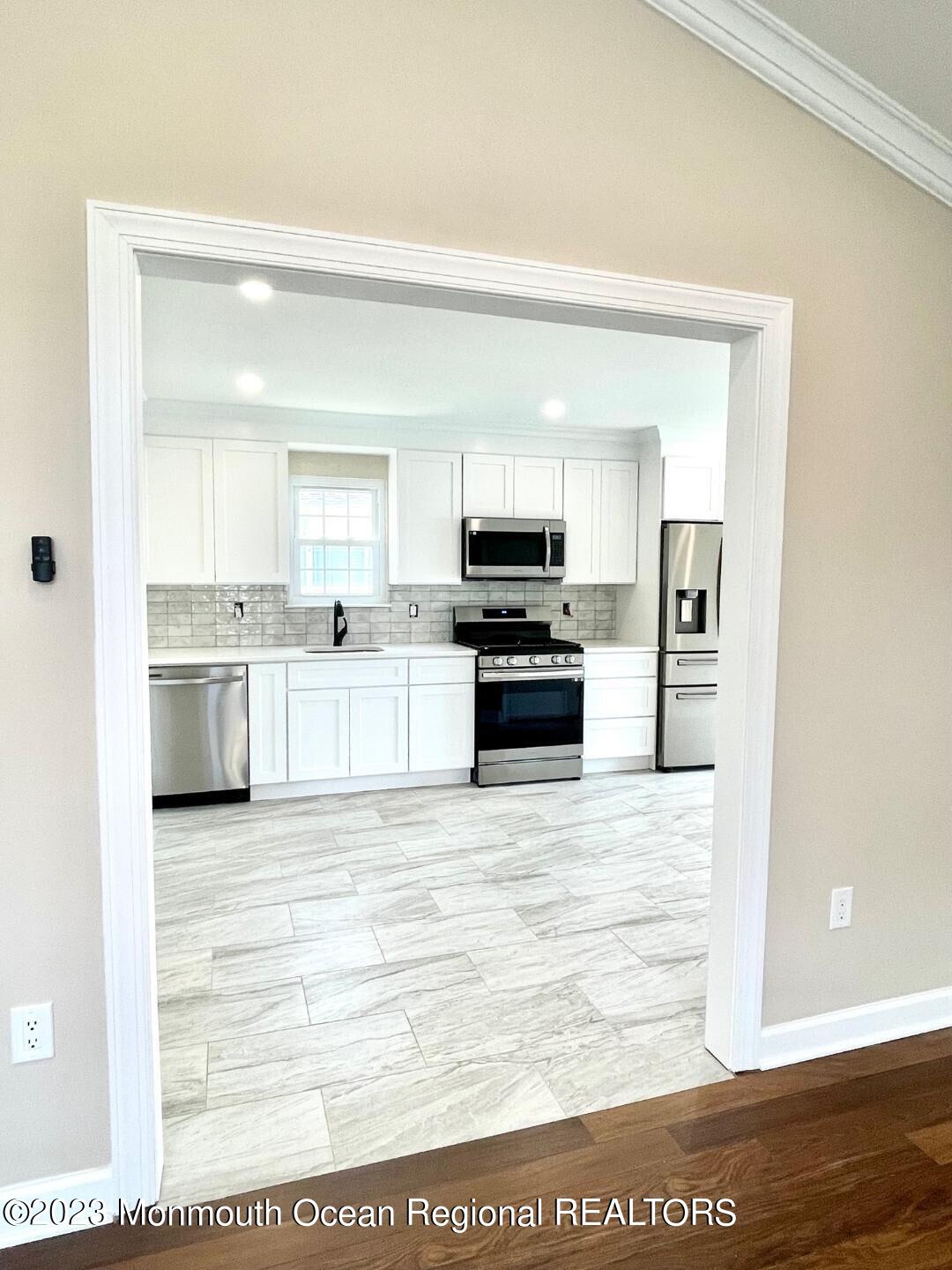 9 Ivy Ridge Close, Unit 1000 Freehold, NJ 07728 - Photo 6 of 31 9 IVY NEW KIT 4