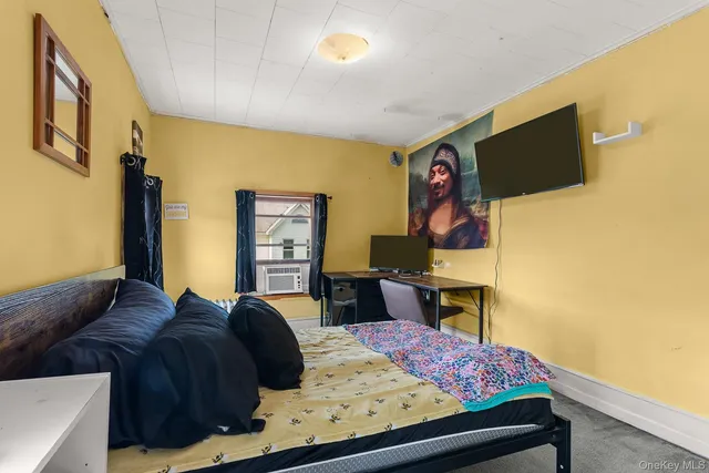 a view of a hallway with entryway door