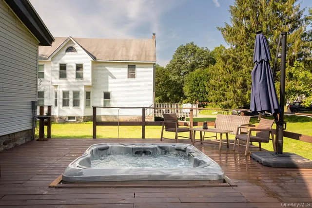 swimming pool view with a outdoor seating