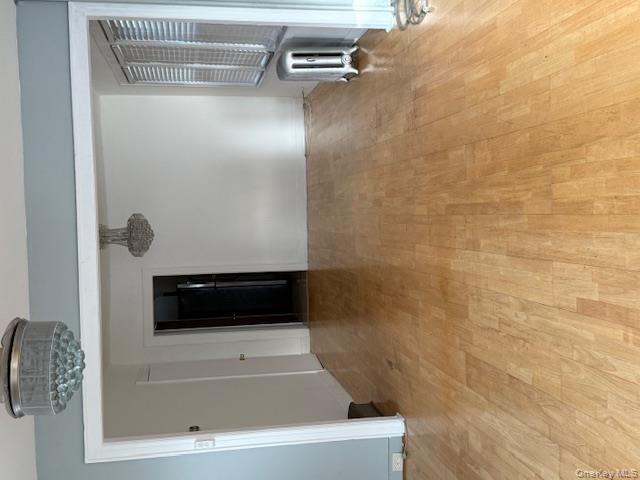 104-27 124th Street Queens, NY 11419 - Photo 3 of 7 a view of a kitchen with a sink