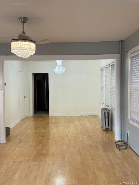 104-27 124th Street Queens, NY 11419 - Photo 5 of 7 a view of an empty room with a window