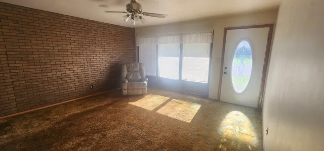 a view of a livingroom with a staircase