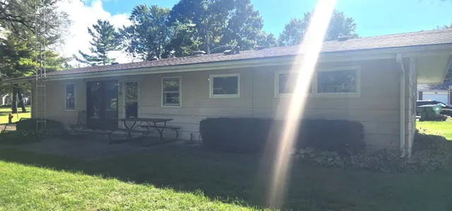 a view of backyard and porch