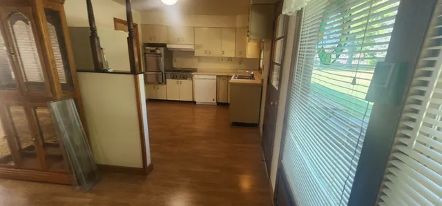 a bathroom with a refrigerator