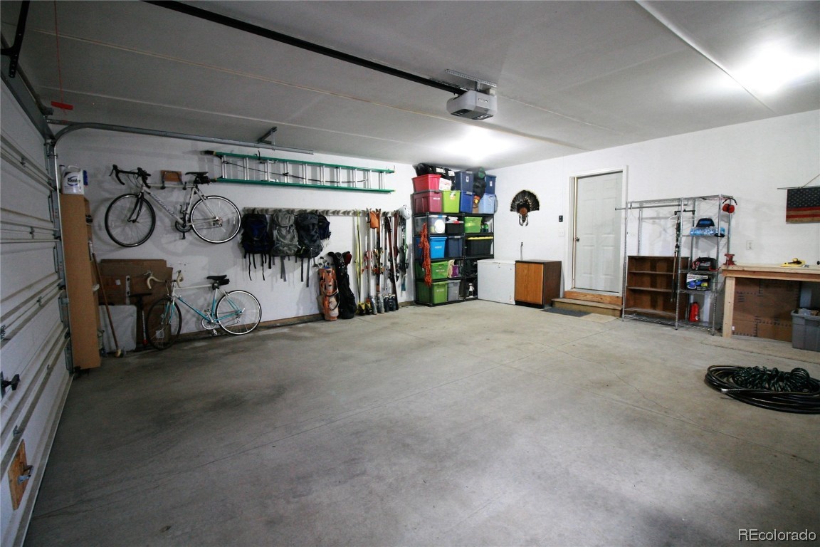 310 Honeysuckle Drive Hayden, CO 81639 - Photo 18 of 22 a view of a garage with rack and bicycle