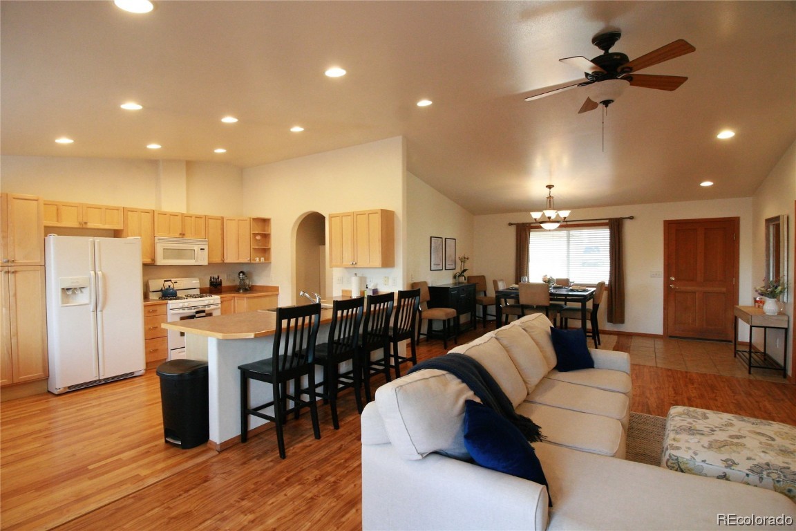 310 Honeysuckle Drive Hayden, CO 81639 - Photo 4 of 22 a living room with lots of furniture and kitchen view
