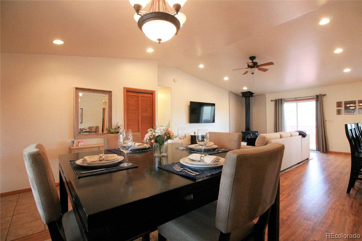310 Honeysuckle Drive Hayden, CO 81639 - Photo 6 of 22 a view of a dining room with furniture and wooden floor