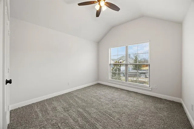 a bathroom with double sink and a mirror