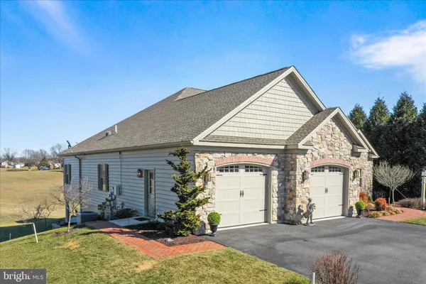 a view of a balcony with wooden floor