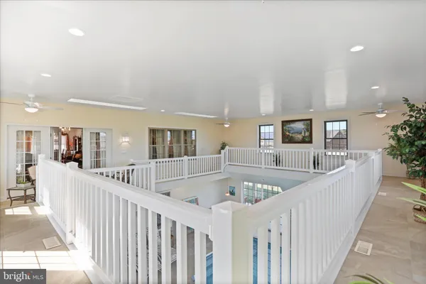 a bedroom with a bed and a table