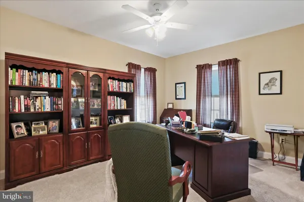 a bedroom with a bed and a table