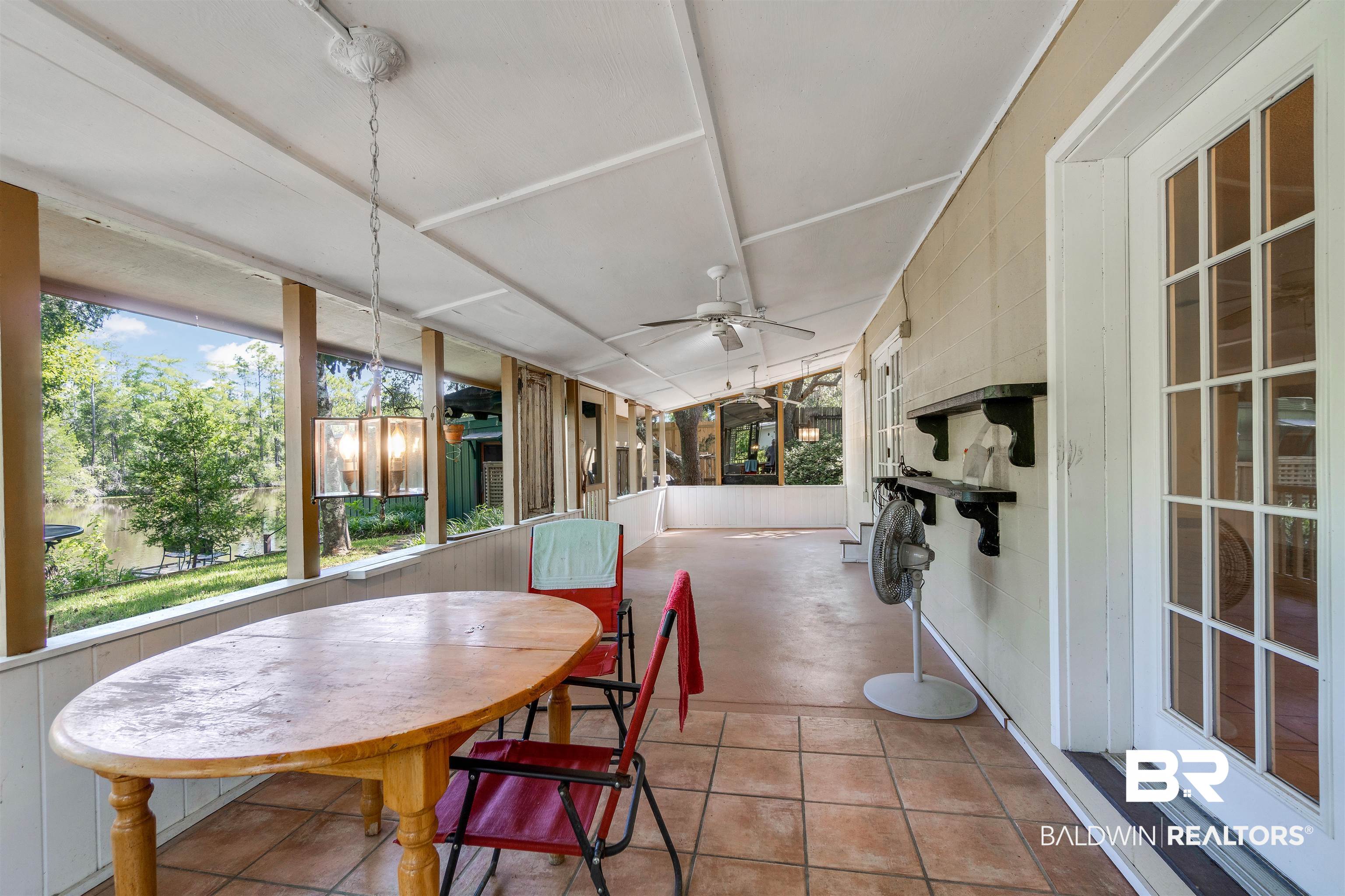 34341 Lost River Road Seminole, AL 36574 - Photo 21 of 36 Sunroom featuring a ceiling fan