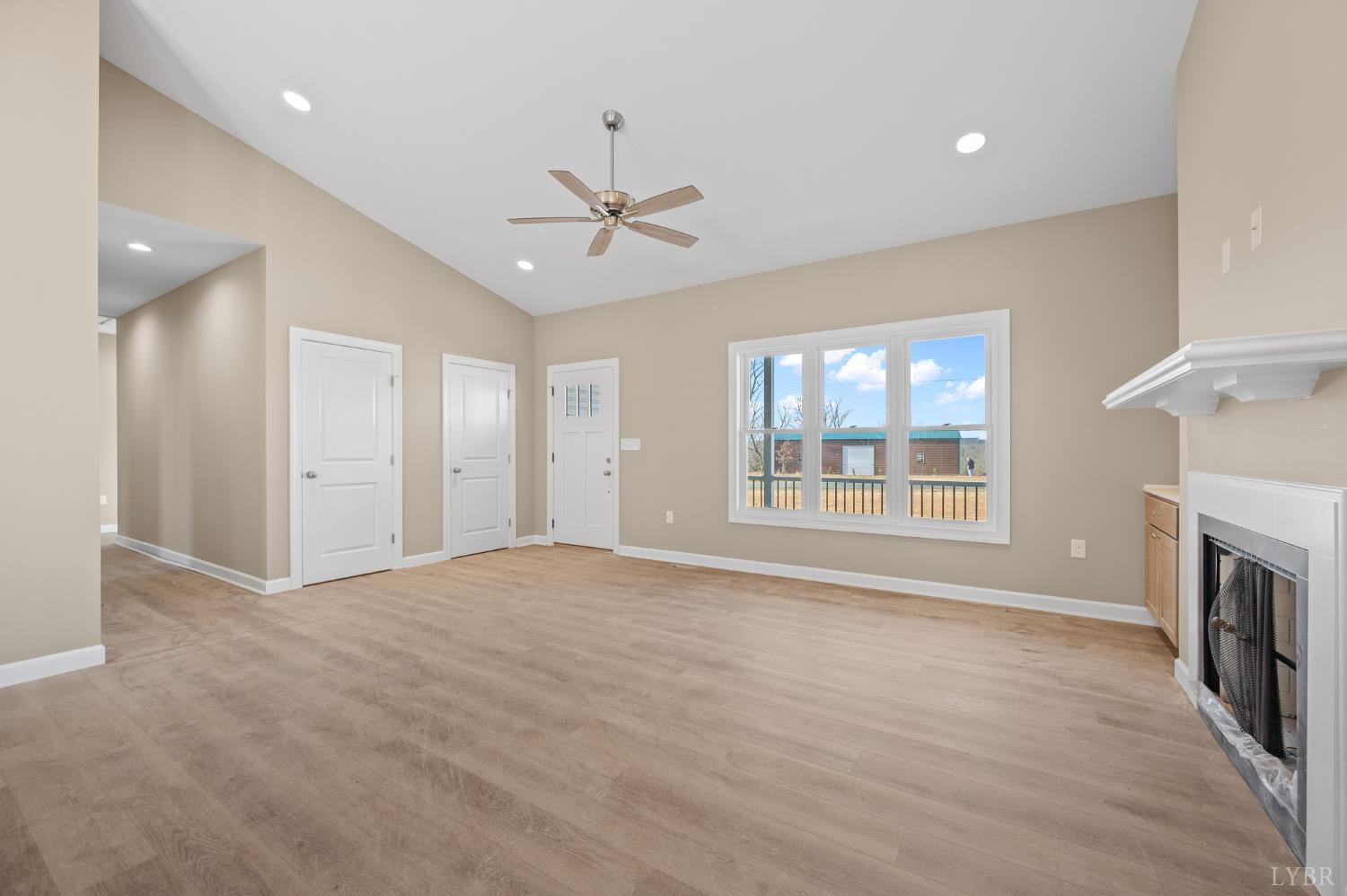 1720 Oak Rdg Road Appomattox, VA 24522 - Photo 12 of 53 a view of an empty room with a window and fireplace