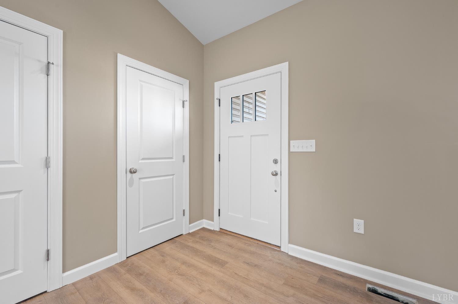 1720 Oak Rdg Road Appomattox, VA 24522 - Photo 2 of 53 a view of an empty room with wooden floor