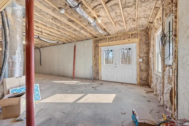a view of a porch with a wooden fence