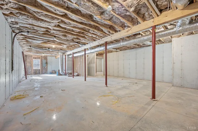 a view of a room with wooden walls