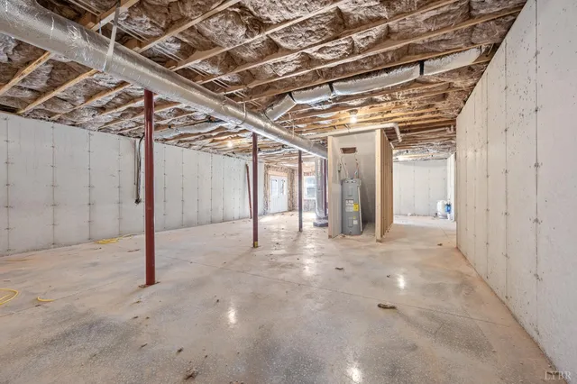 a view of a room with wooden walls