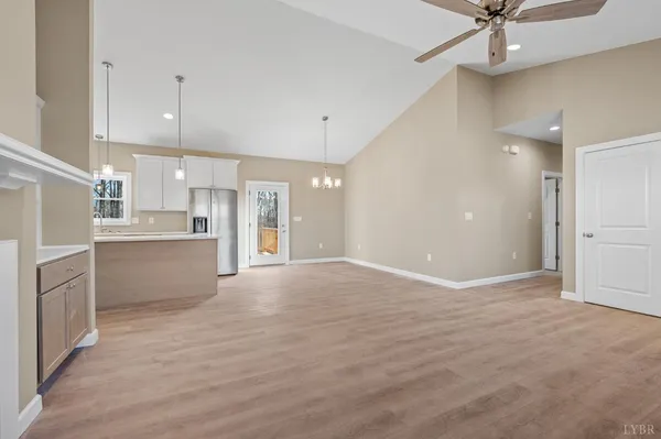 a view of a kitchen with a sink and cabinets