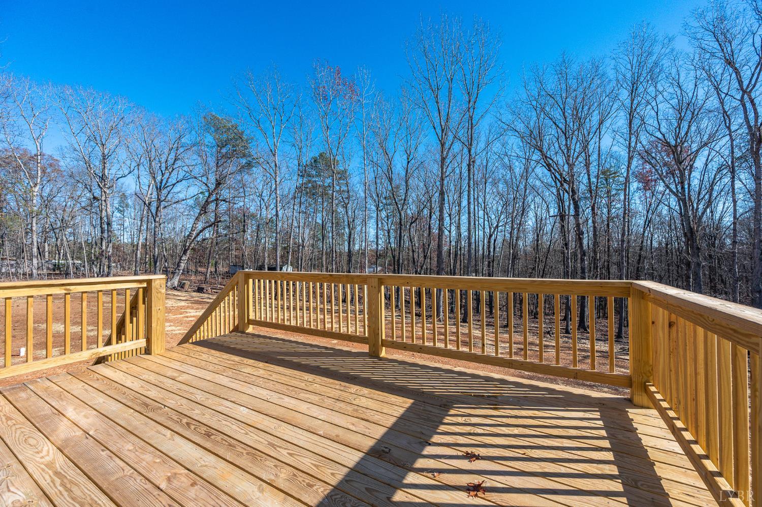 1720 Oak Rdg Road Appomattox, VA 24522 - Photo 43 of 53 a view of deck with wooden floor and fence with a trees