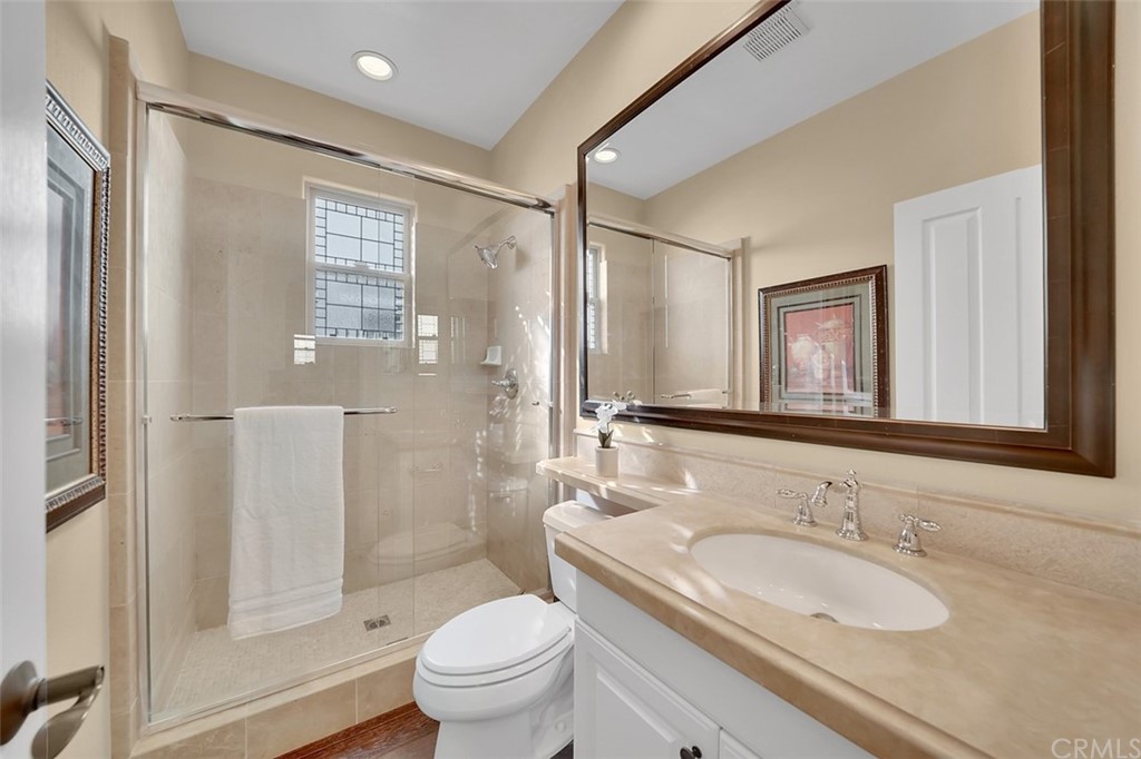 31 Via Soria San Clemente, CA 92673 - Photo 15 of 59 a bathroom with a granite countertop sink toilet and shower