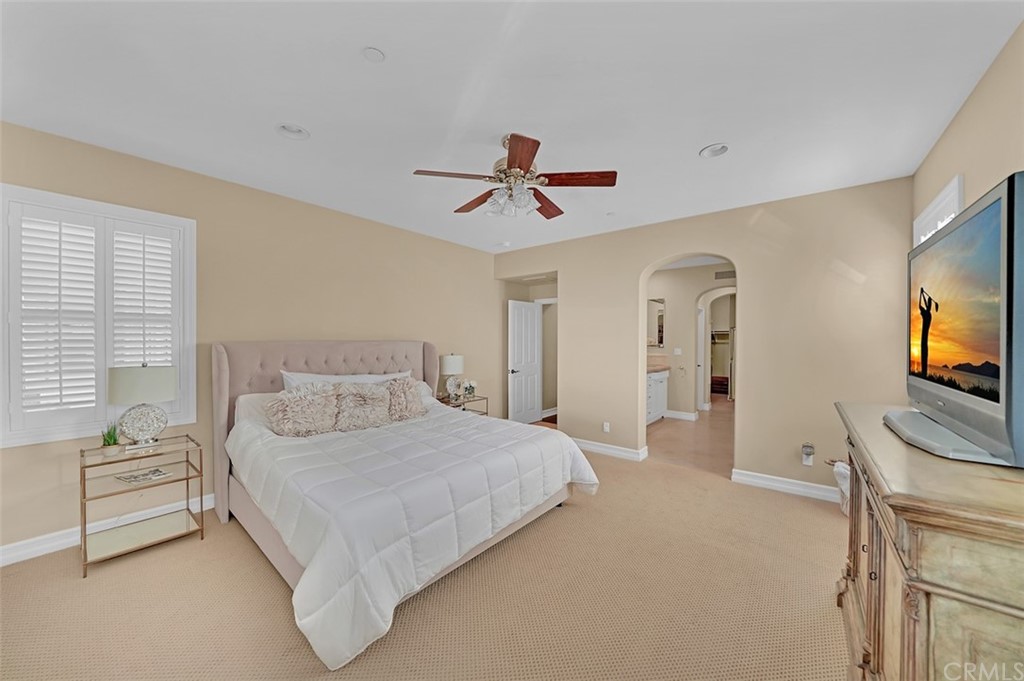 31 Via Soria San Clemente, CA 92673 - Photo 19 of 59 a bedroom with a bed and a flat screen tv