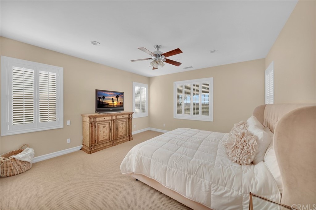 31 Via Soria San Clemente, CA 92673 - Photo 21 of 59 a bedroom with a bed and a television
