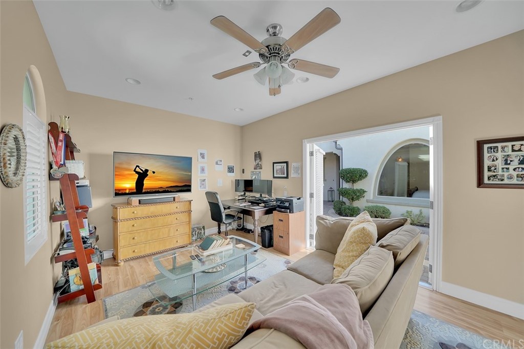 31 Via Soria San Clemente, CA 92673 - Photo 37 of 59 a living room with furniture and a flat screen tv