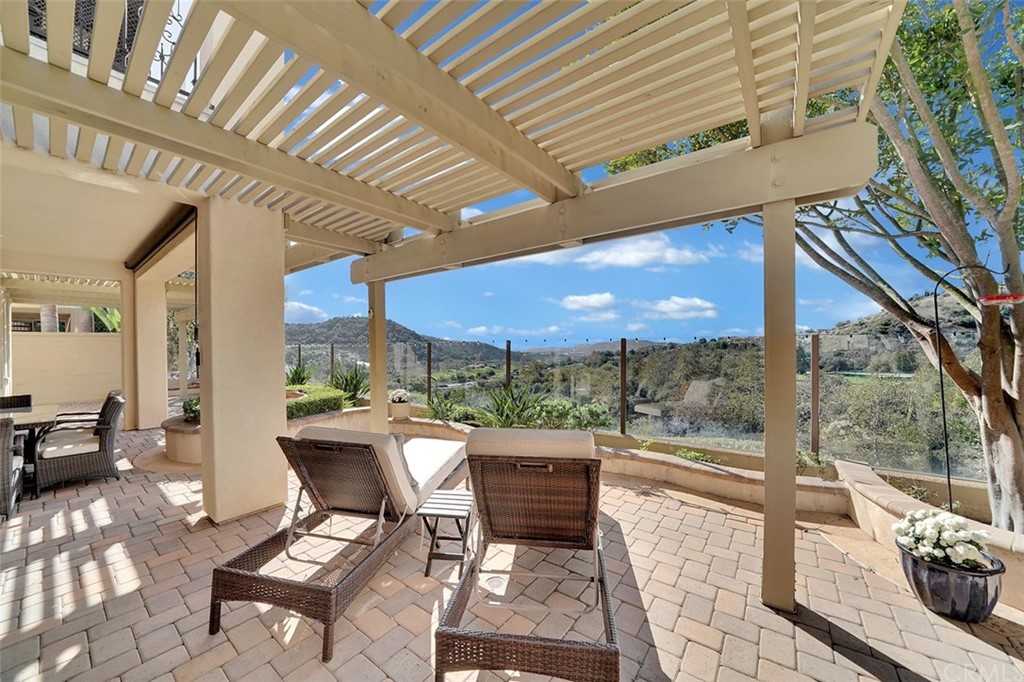 31 Via Soria San Clemente, CA 92673 - Photo 46 of 59 a building outdoor space with patio furniture and potted plants