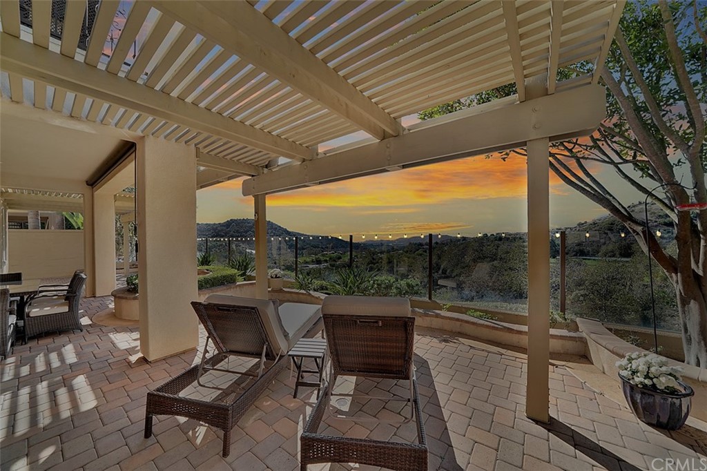 31 Via Soria San Clemente, CA 92673 - Photo 57 of 59 a roof deck with table and chairs and potted plants