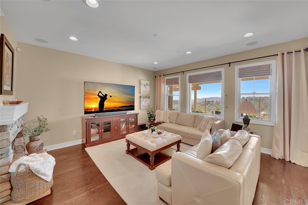 31 Via Soria San Clemente, CA 92673 - Photo 10 of 59 a living room with furniture and a flat screen tv