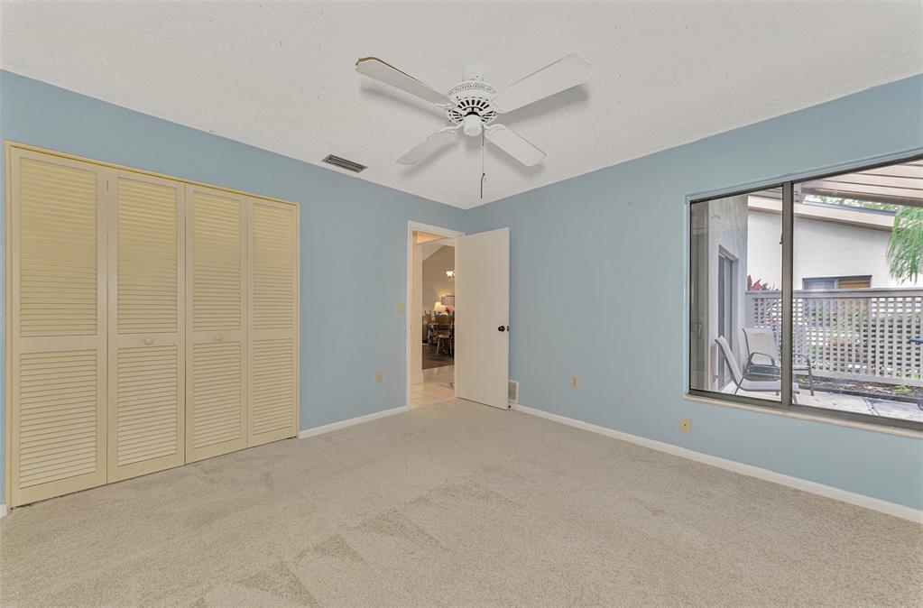 4521 Kingsmere, Unit 6 Sarasota, FL 34235 - Photo 28 of 42 a view of an empty room with a window