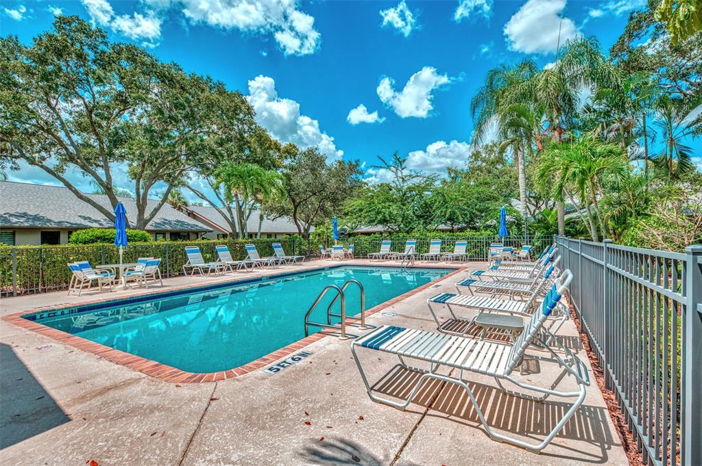 4521 Kingsmere, Unit 6 Sarasota, FL 34235 - Photo 42 of 42 a view of swimming pool with seating space