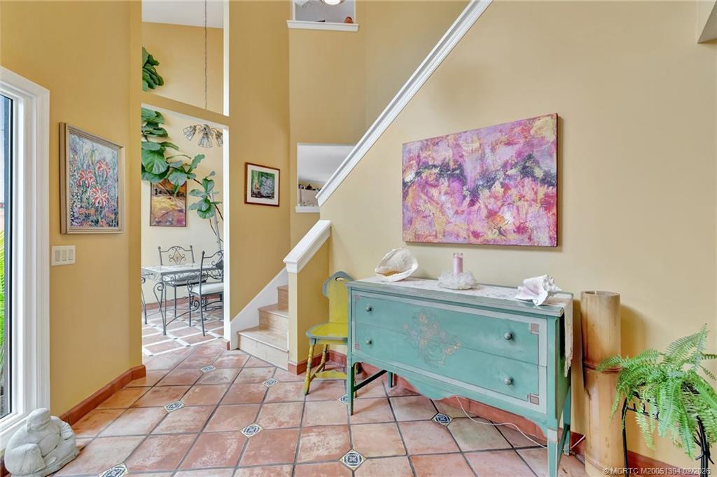 221 Coconut Avenue Stuart, FL 34996 - Photo 5 of 20 a view of a hallway with workspace