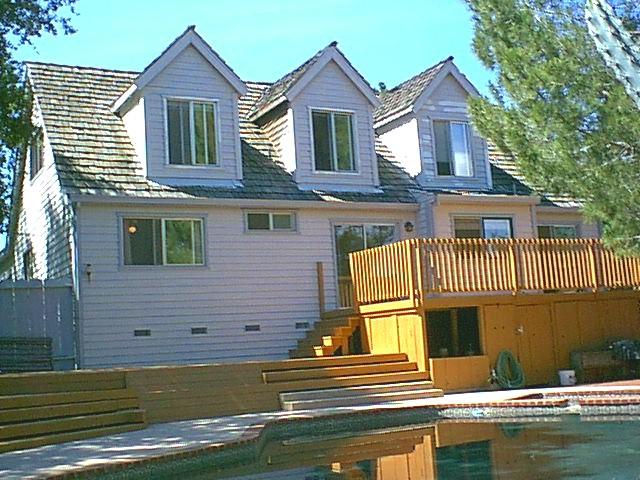 2550 Ruby Court Redding, CA 96001 - Photo 3 of 5 a front view of a house with a yard