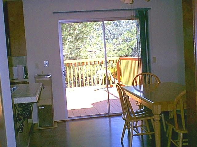 2550 Ruby Court Redding, CA 96001 - Photo 5 of 5 a view of a balcony with chair and table