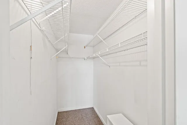 a view of small space with racks on the wall