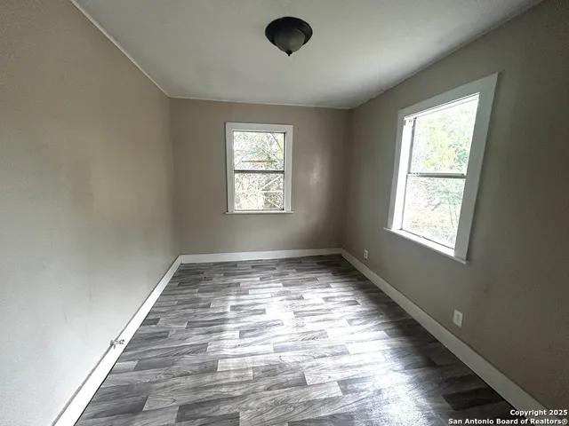 a view of an empty room and window